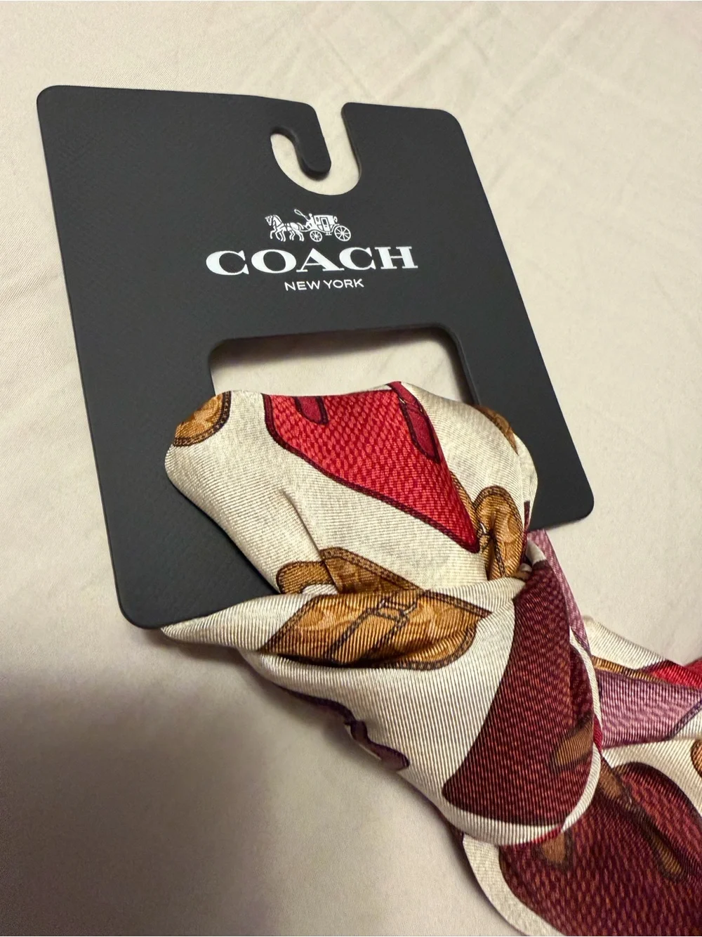 Coach Cream Scarf with Brown, Gold, Red and Pink Handbag Motif